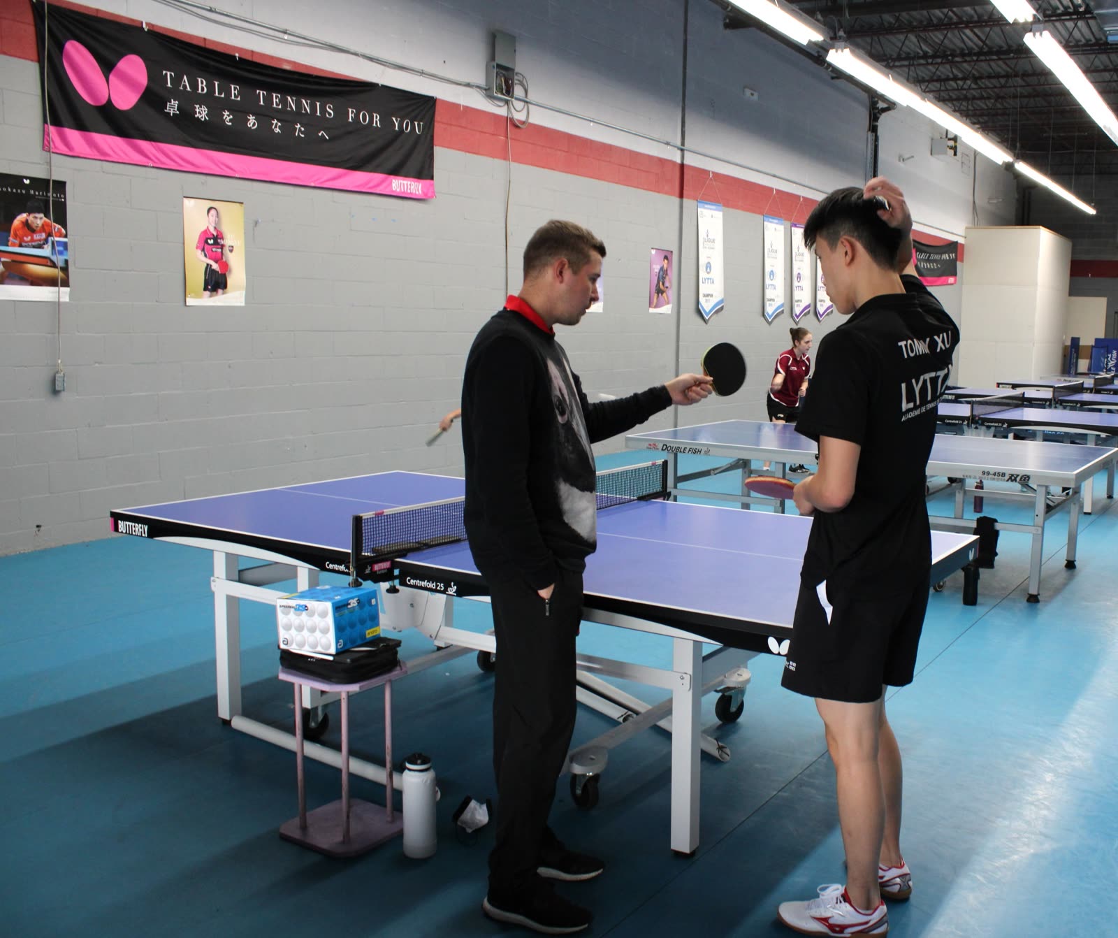 Coach training a player at LYTTA